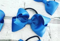 Image 4 of Classic Bowtique, medium.