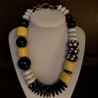 Image 2 of Black, white & yellow necklace