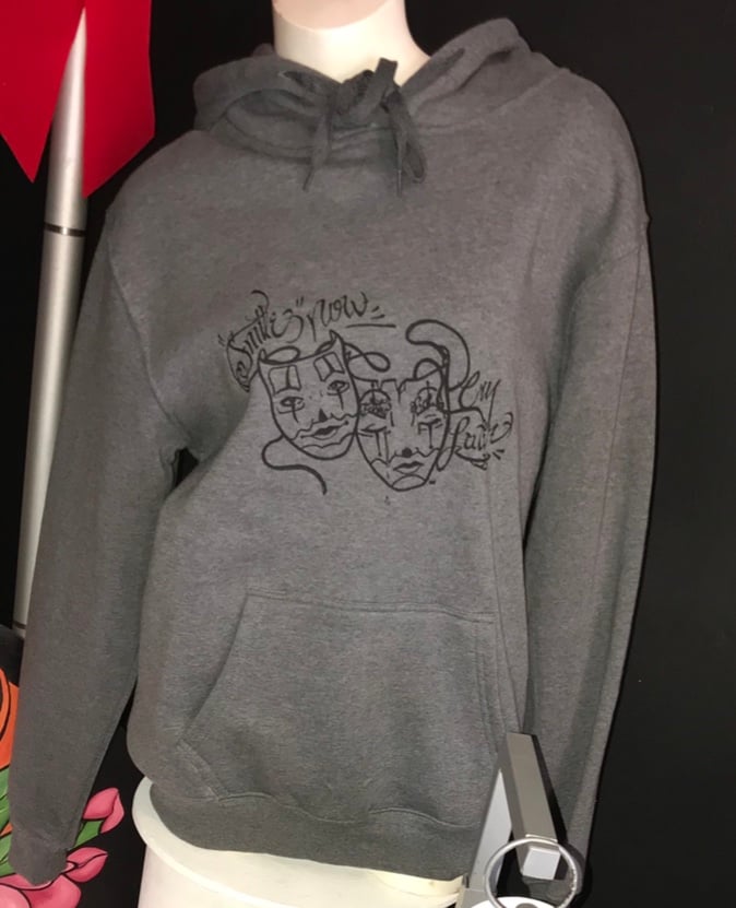 Laugh Now Cry Later Hoodie - Meow Wolf Shop
