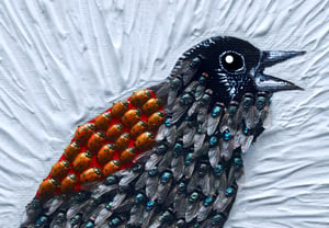 Image of Red winged black bird (made with ladybugs and flies)