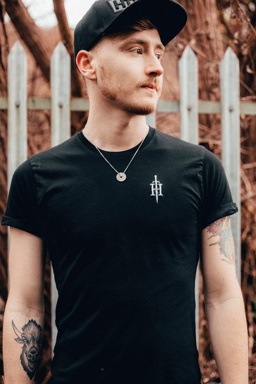 Image of Embroidered "H" Emblem Tee