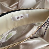 Image 3 of neutral magical friends vinyl pouch