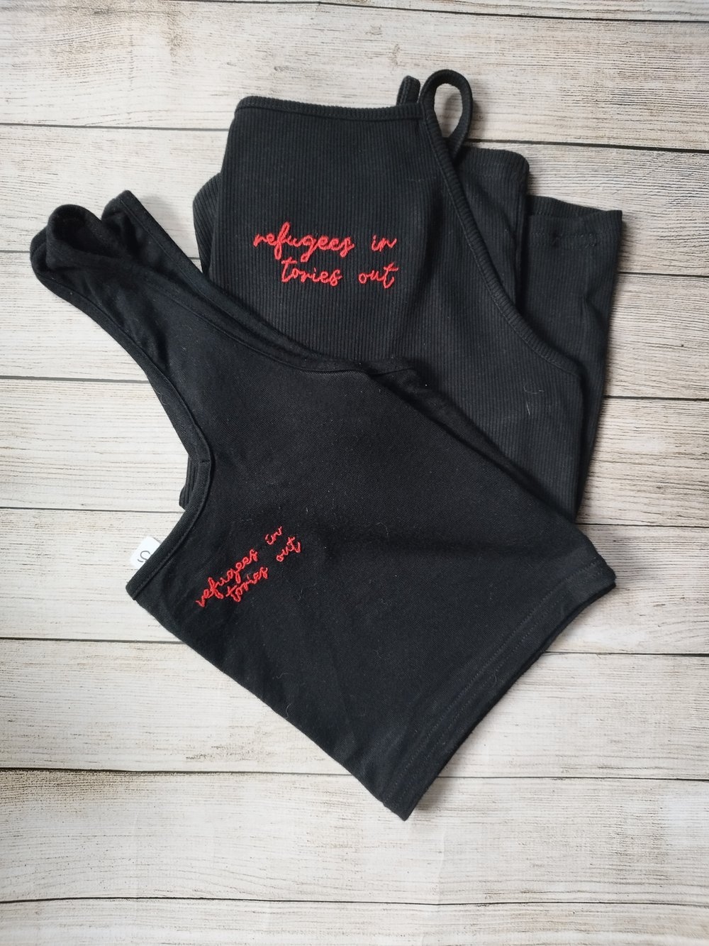 Image of refugee solidarity tops