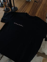 Image 2 of WORLD IS YOUR$ TEE