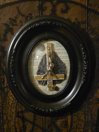 Image 2 of 2way- Black oval frame - bubble glass with preserved web, 1800s Bible page and crucifix 