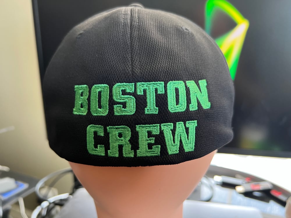 Black Flexfit hat with solid green SSD logo with rear “Boston Crew” logo