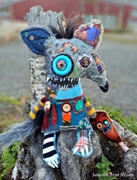 Image 5 of "Benson" the wolf and "George" the chicken leg 