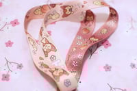Image 3 of peachy skitty lanyard 