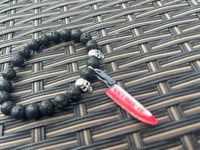 Image 3 of Men’s Halloween bracelet made with lava stone beads and knife charm 