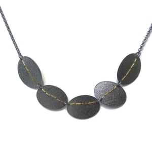 Image of Sewn Up 5 disc necklace