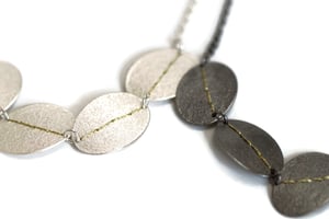 Image of Sewn Up 5 disc necklace