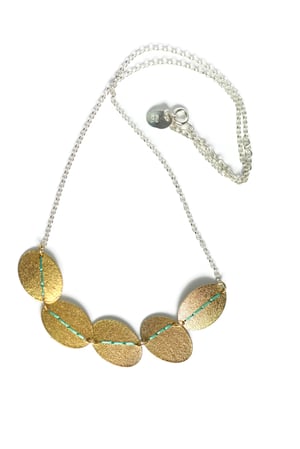 Image of Sewn Up 5 disc necklace