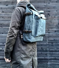 Image 1 of  Waxed canvas backpack with roll to close top and vegetable tanned leather shoulder straps