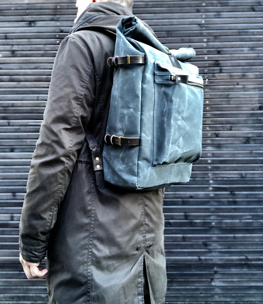 Image of  Waxed canvas backpack with roll to close top and vegetable tanned leather shoulder straps