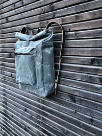 Image 3 of  Waxed canvas backpack with roll to close top and vegetable tanned leather shoulder straps