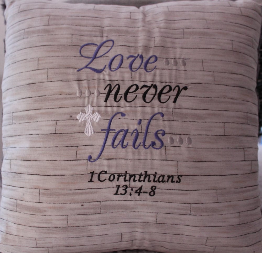 Image of Love Never Fails Throw Pillow