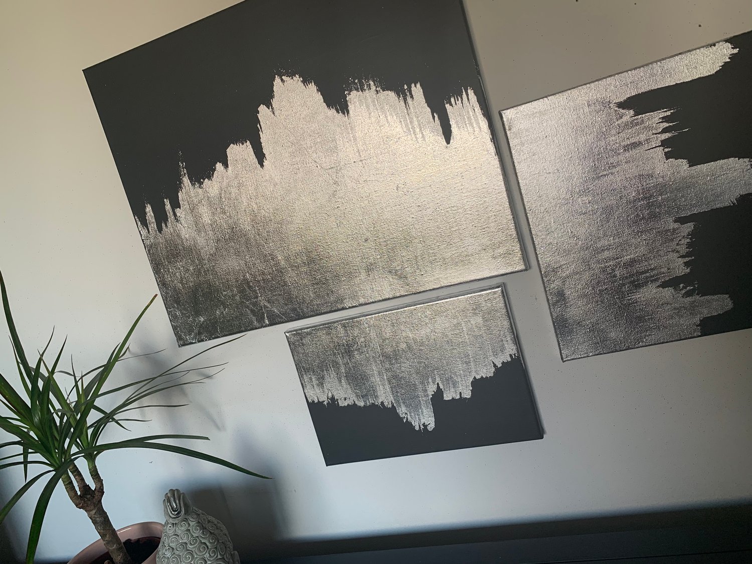 Image of A set of 3 dark grey & silver leaf canvases made by Ethan & Grace’s 