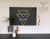 Image 2 of Gold leaf set on a black background 