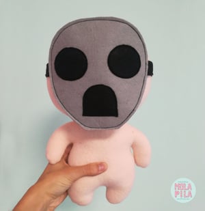 Image of Isaac toy with three accessories.