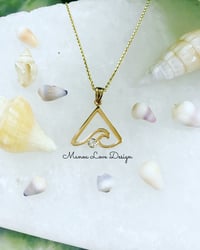 14k solid gold triangle Hawaiian wave with white diamond