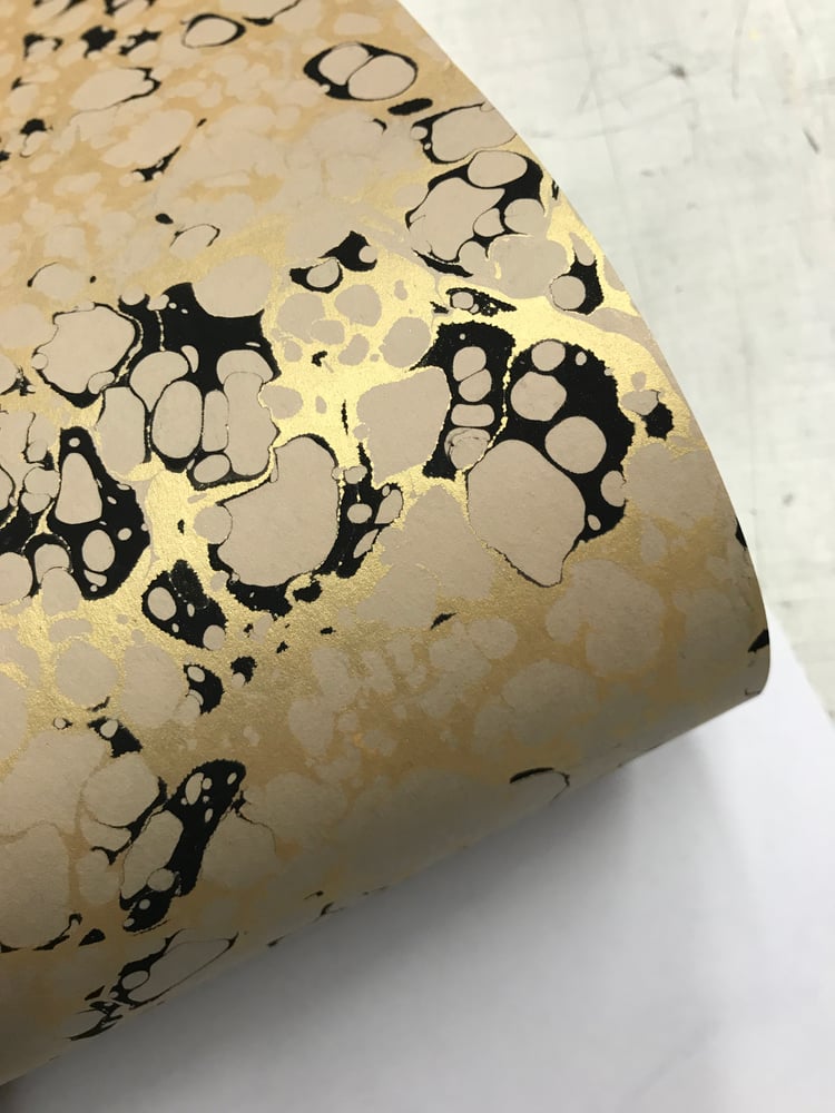 Image of Marbled paper #91  - 'Metallic Gold & black vein' on Fawn