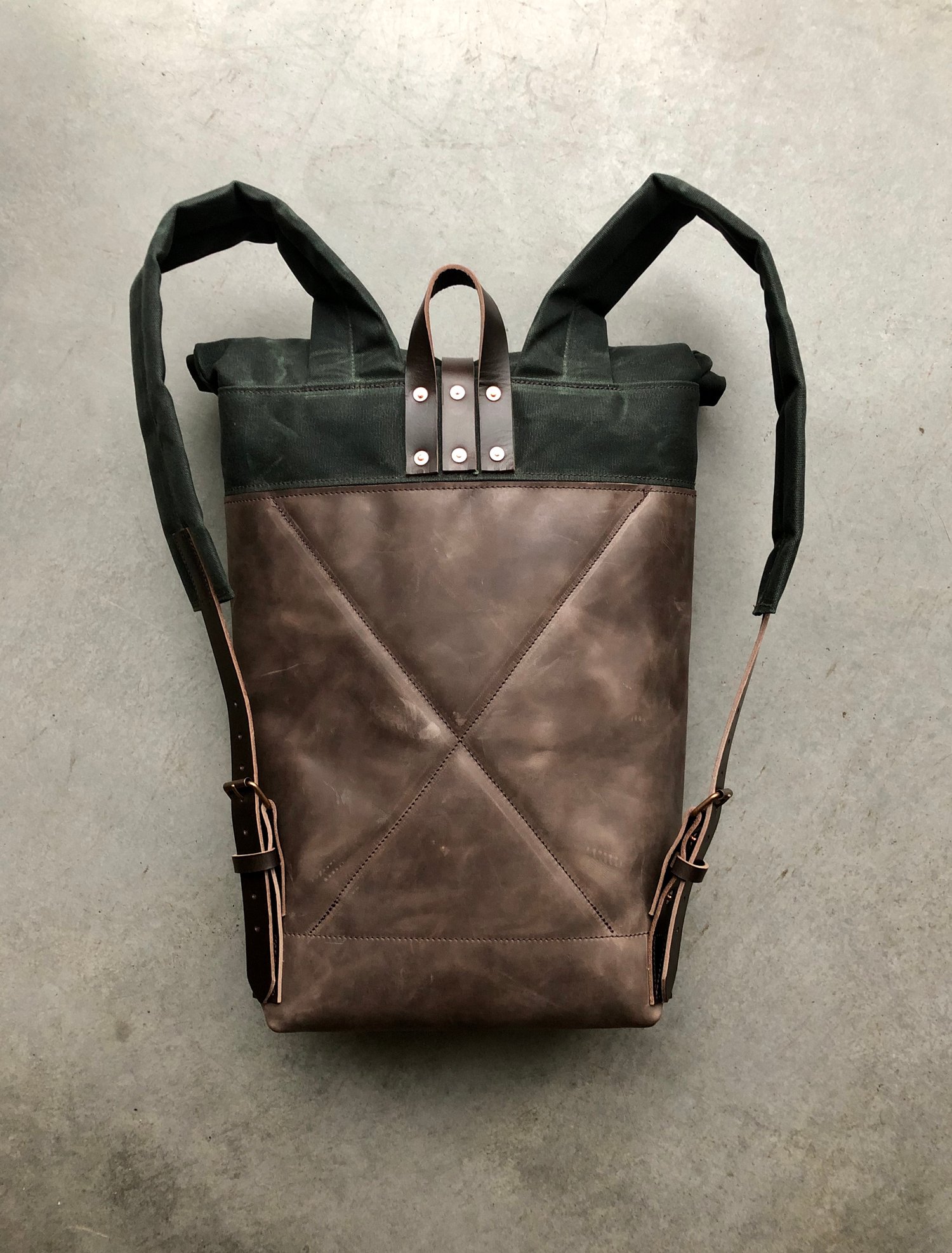 Image of Medium size, leather and waxed canvas backpack, with padded shoulder straps