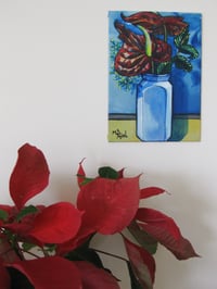 Image 3 of Red Anthuriums in a white vase