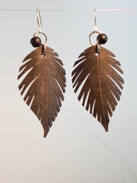 Image 2 of Raw Large Feather Bike Inner Tube Earrings 