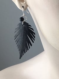 Image 1 of Raw Large Feather Bike Inner Tube Earrings 