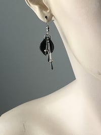 Image 1 of Pixie Fan Faceted Glass Hematite Beaded Drop Bike Inner Tube Earrings