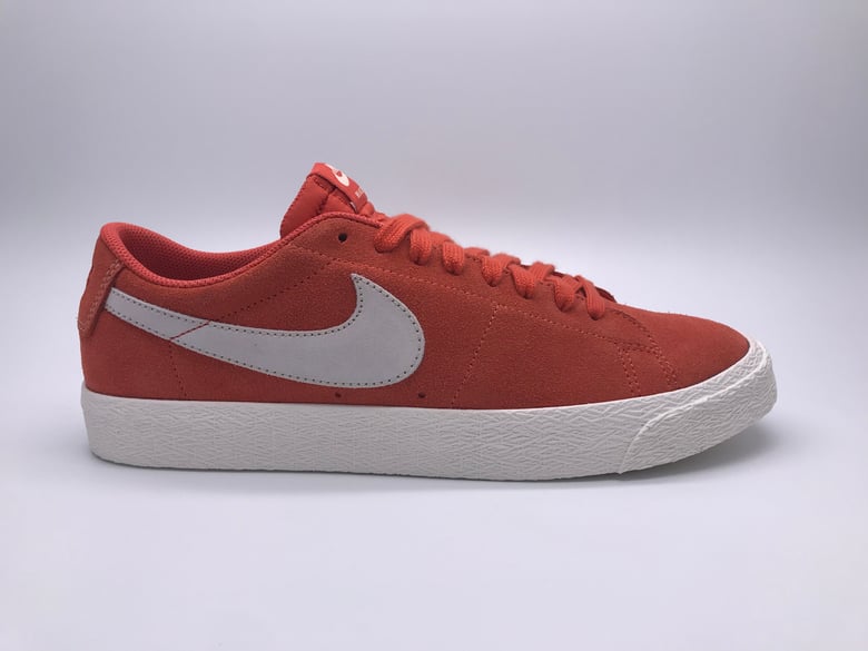 Image of NIKE SB ZOOM BLAZER LOW “CORAL”