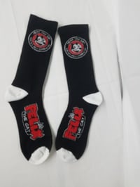 Image 1 of Red circle Felix the Cat black socks