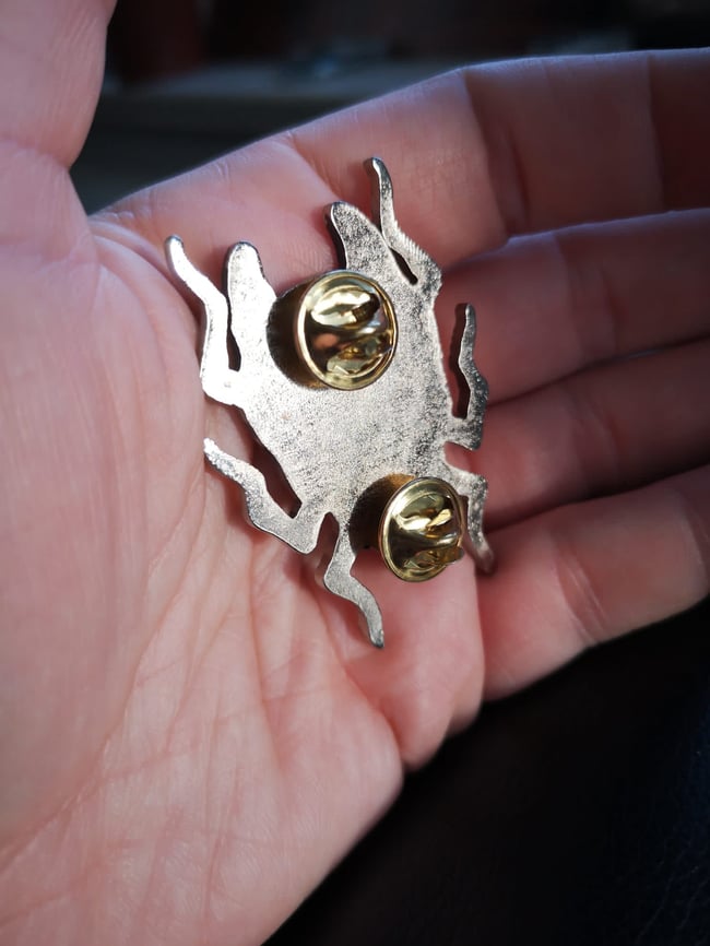 "Metamorph" Metal Pin