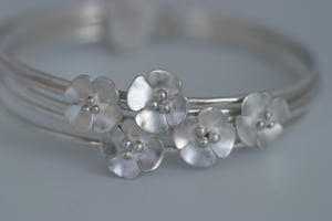 Image of Silver or Oxidised Flower skinny stacking bangle