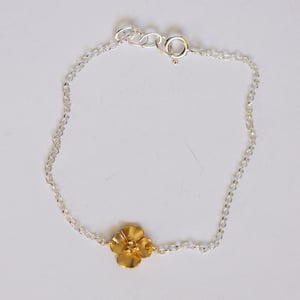 Image of Buttercup bracelet with a single flower
