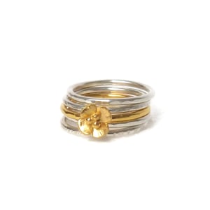 Image of Silver stacking rings with flower