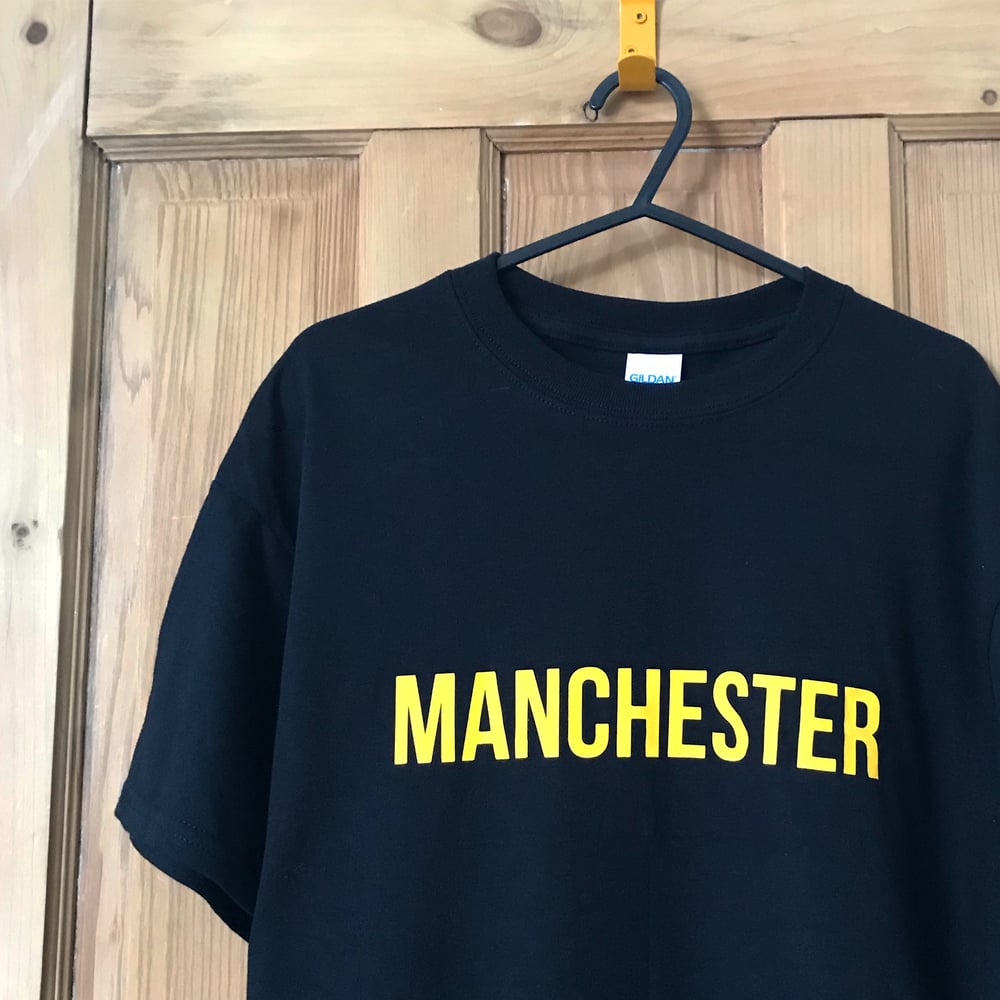 Image of MANCHESTER T-SHIRT IN BLACK + YELLOW