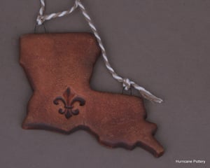 Image of Louisiana Ornaments Rustic Ceramic Clay with Fleur De Lis. Leather Look Ornaments. Rustic