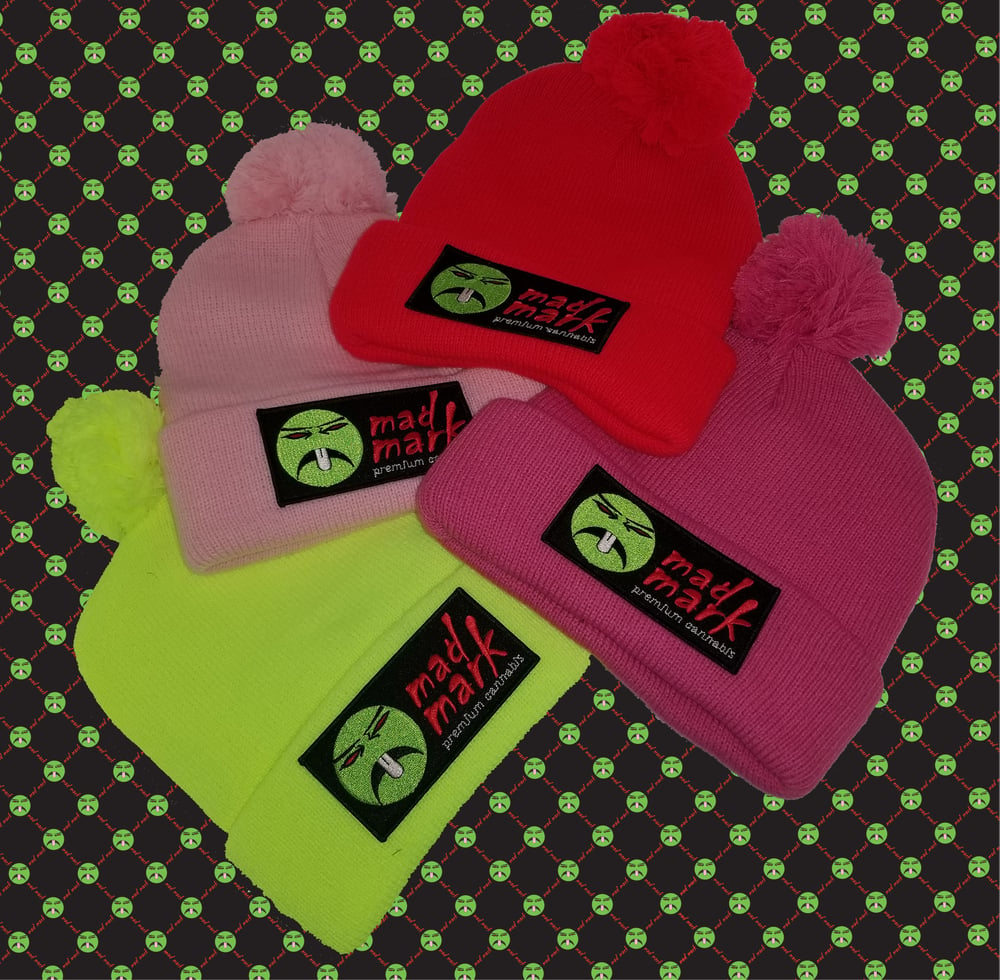 Image of puff ball  patch beanie