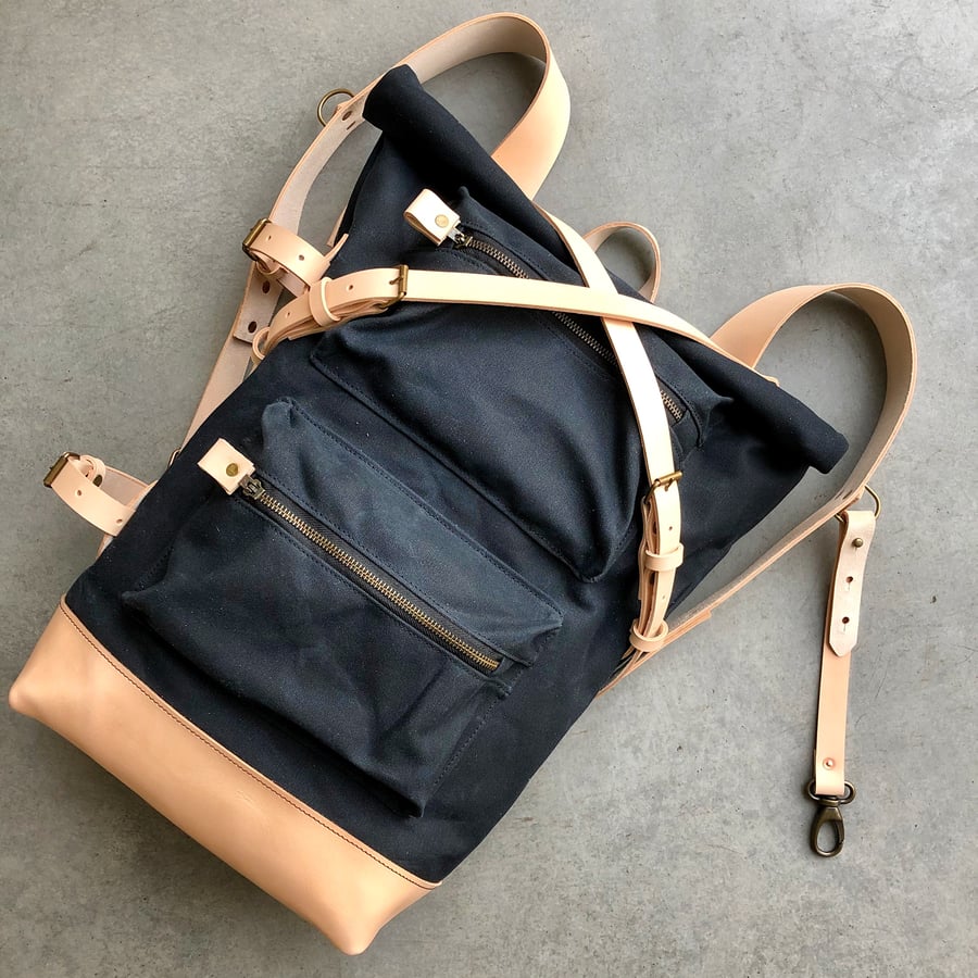 Image of Backpack made in waxed canvas and natural vegetable tanned leather with double zipper pocket