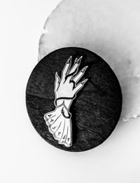The Oracle enamel pin