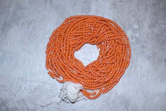 Image of Orange Tie Waistbead 