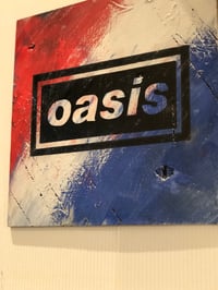 Image 2 of Oasis iconic logo hand painted on wood