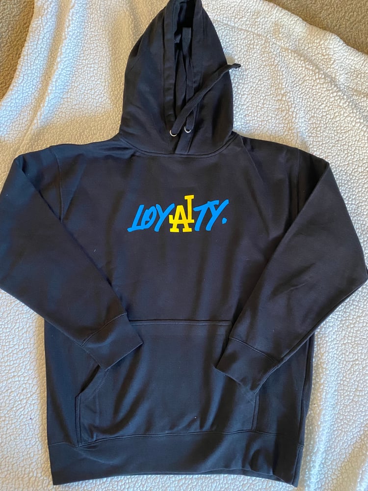 Image of Light blue and yellow hoodie unisex 