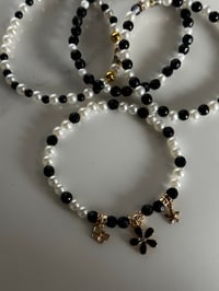 Image 7 of Wild Blooms Black, Gold, and Cream Tumbler Bracelet Stack