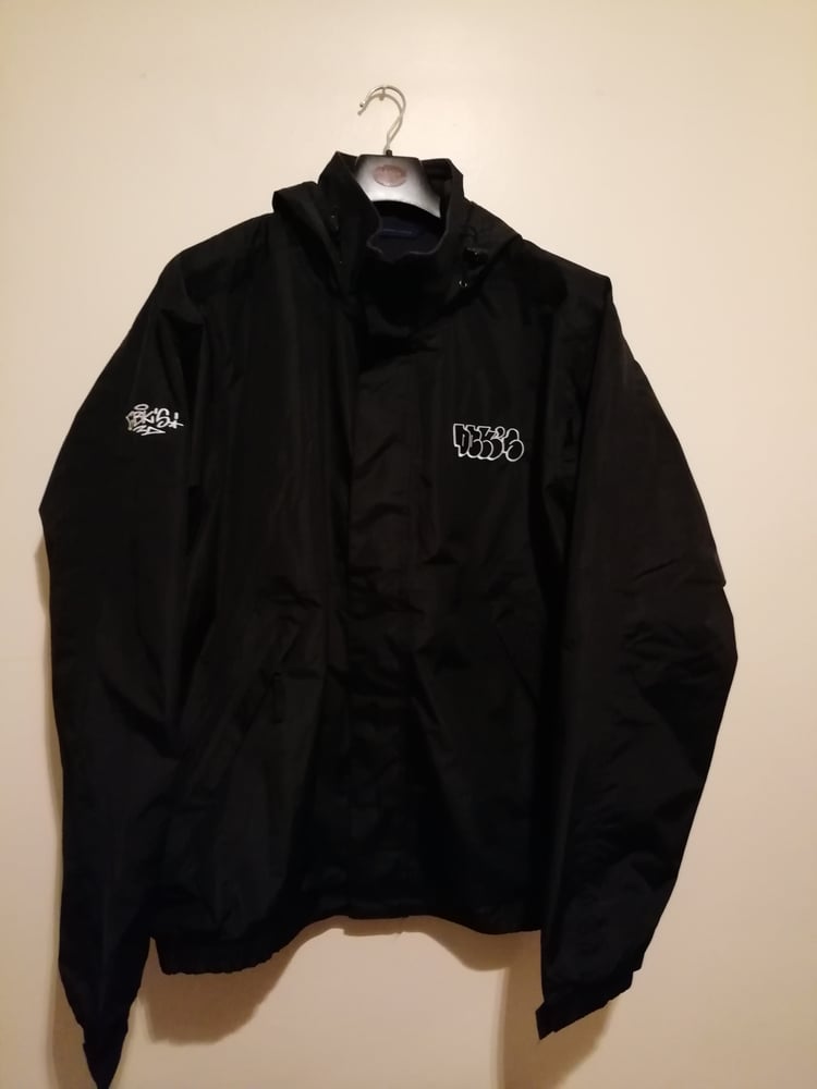 Image of DBK'S embroidered rain coat