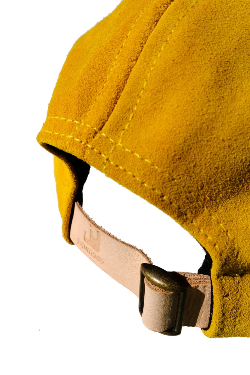 Image of mustard suede cap