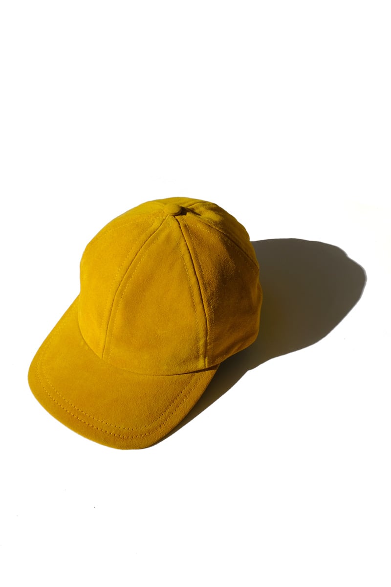 Image of mustard suede cap