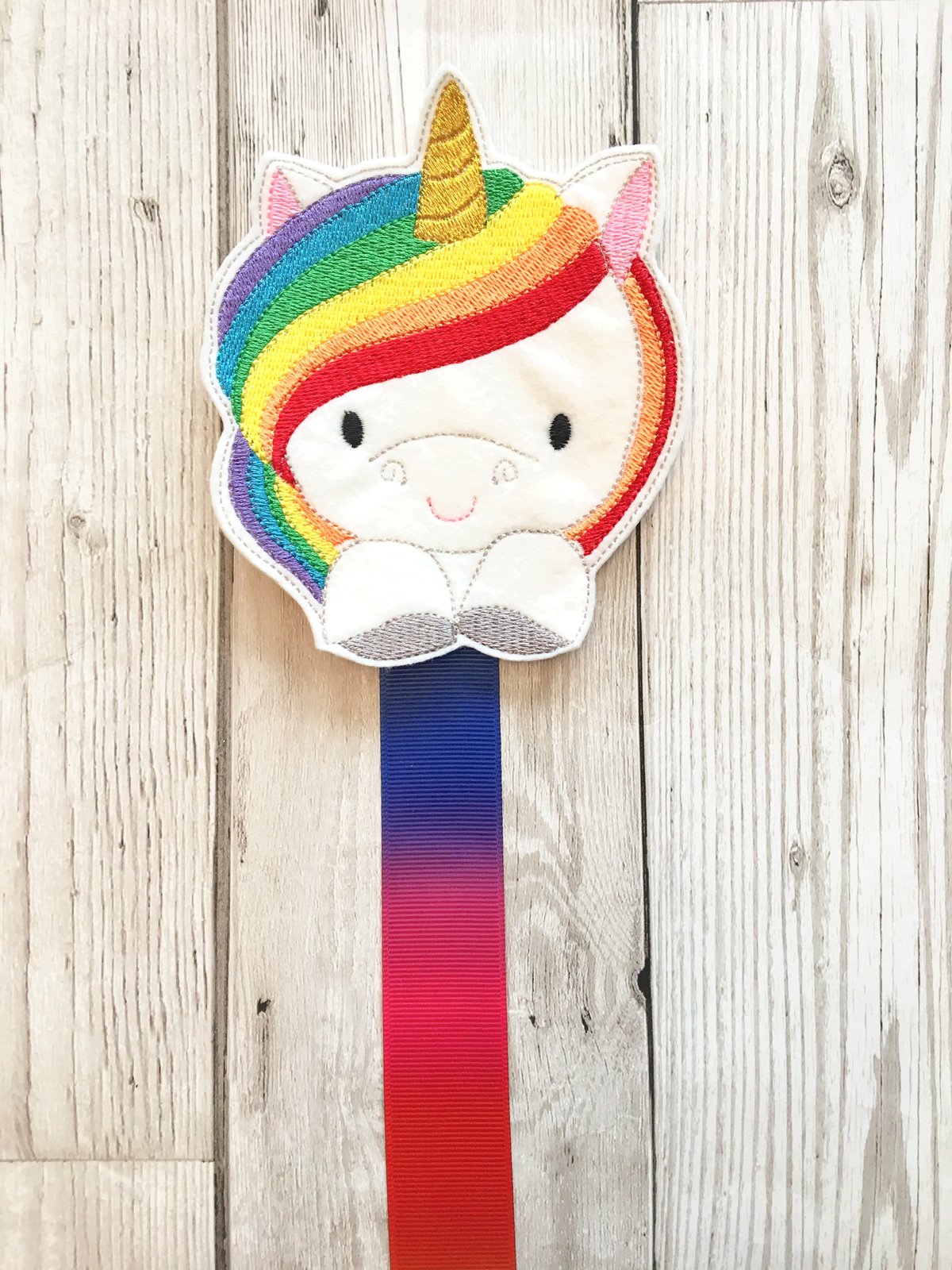 Image of Rainbow unicorn bow and bow holder