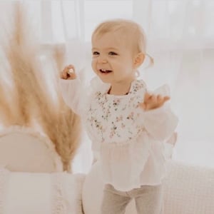 Image of Rosie Pom Pom Bib